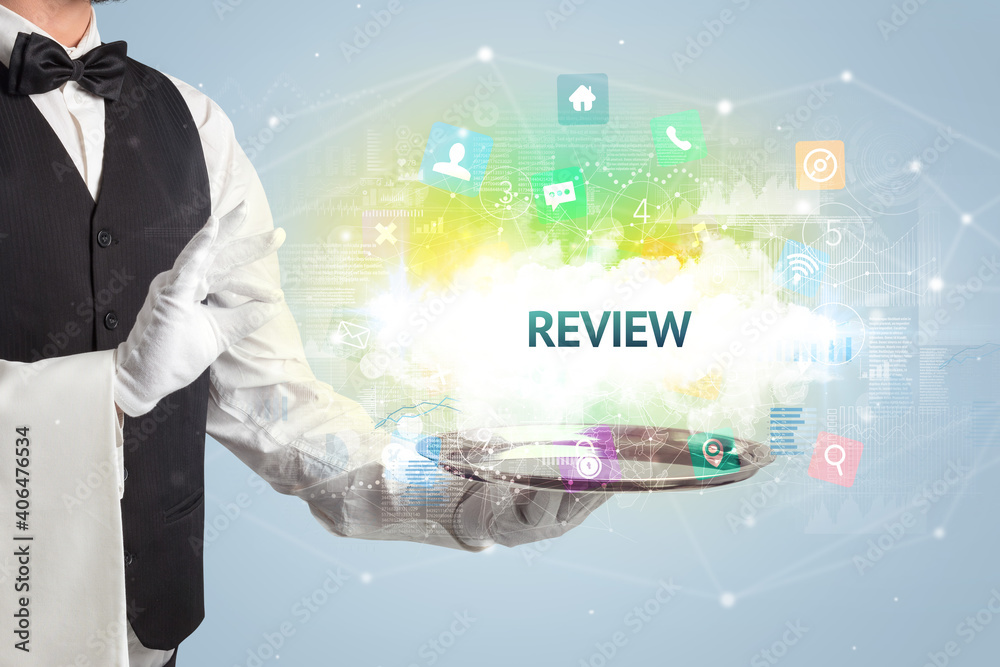 Waiter serving social networking concept with REVIEW inscription Waiter serving social networking concept with REVIEW inscription