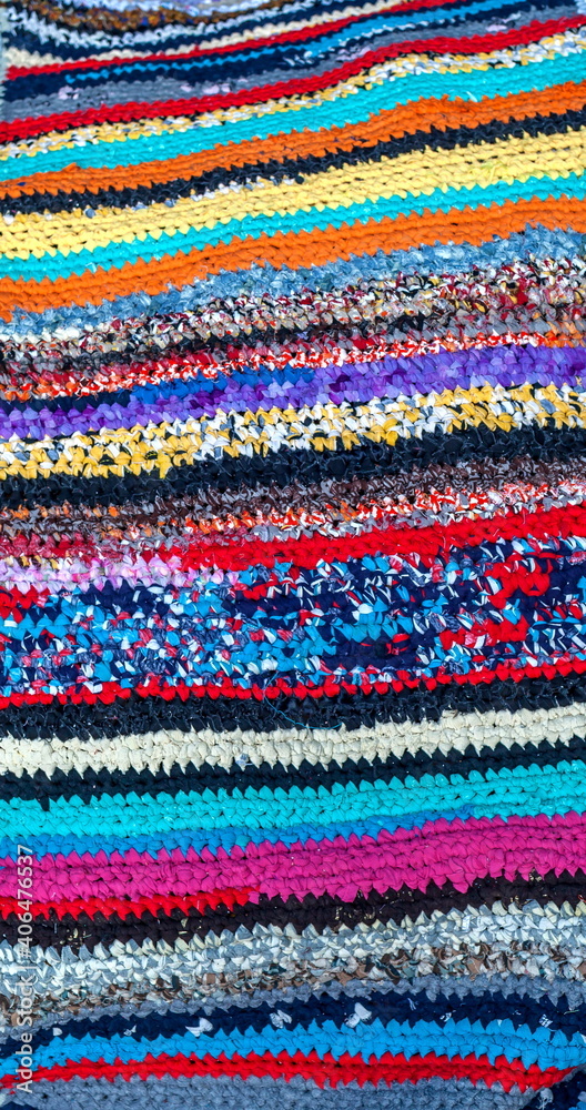 Crocheted by hand from strips of fabric rugs closeup Crocheted by hand from strips of fabric rugs closeup