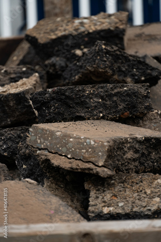 broken pieces of asphalt from a driveway install