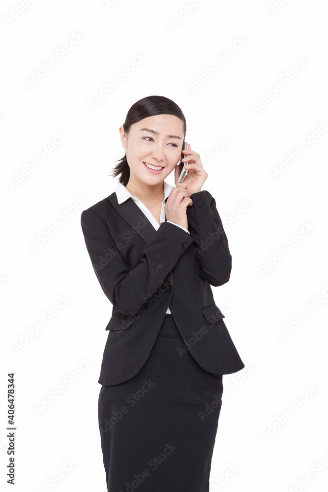 A young Business woman using cell phone A young Business woman using cell phone