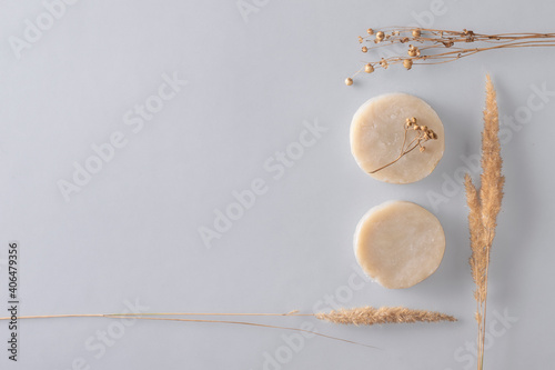 Natural herbal soap on a gray background with copy space. Zero waste concept.