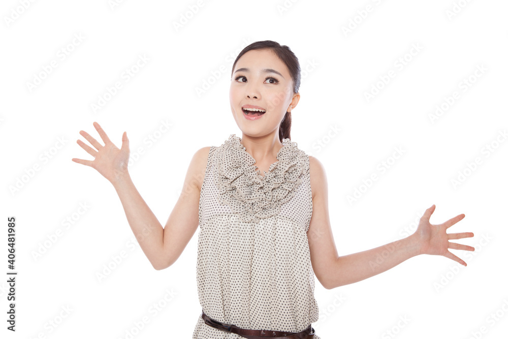 Young woman standing with arms outstretched surprised Young woman standing with arms outstretched surprised