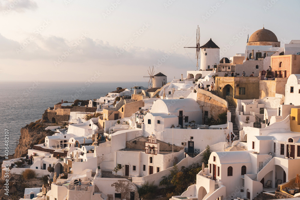 sunset in Oia village on Santorini island, Greece