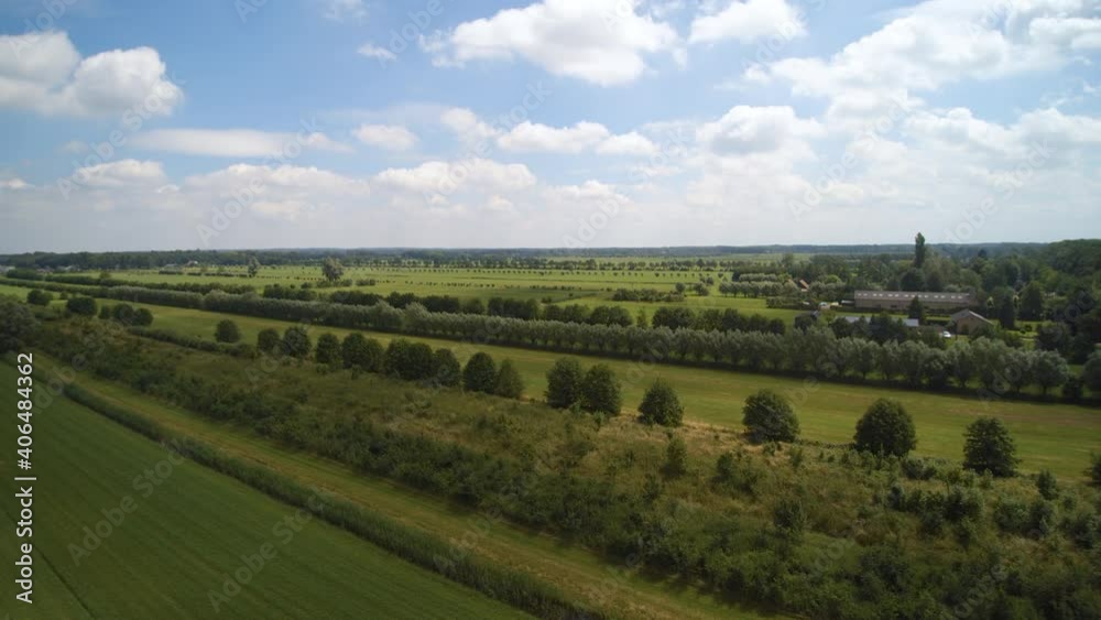 Aerial view of lush green park and agriculture fields in clear daylight Aerial view of lush green park and agriculture fields in clear daylight