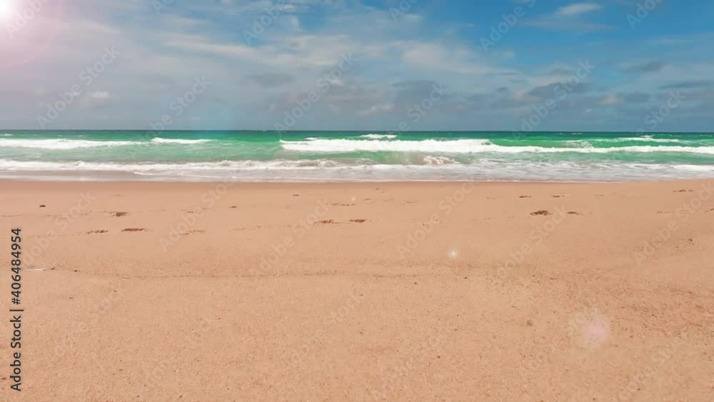 Cyan sea water n white foam ocean wave crashing summer sandy beach with ...