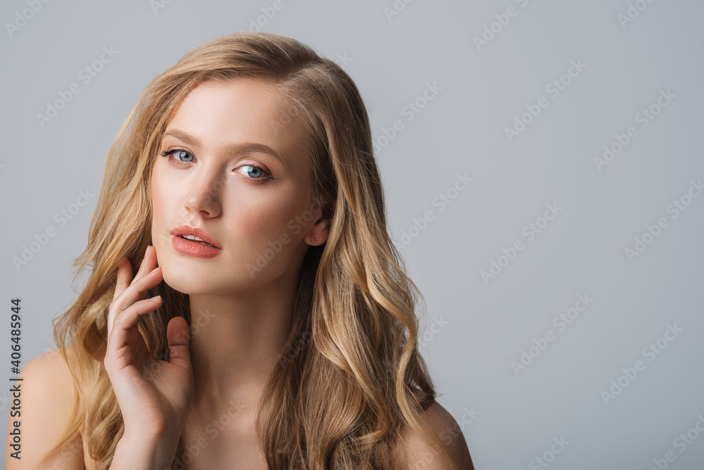 Beautiful confident blonde woman with blue eyes, luxury wavy hair, natural colors makeup.Model touches her face. Close up beauty studio portrait. Copy, empty space for text
Beautiful confident blonde woman with blue eyes, luxury wavy hair, natural colors makeup.Model touches her face. Close up beauty studio portrait. Copy, empty space for text