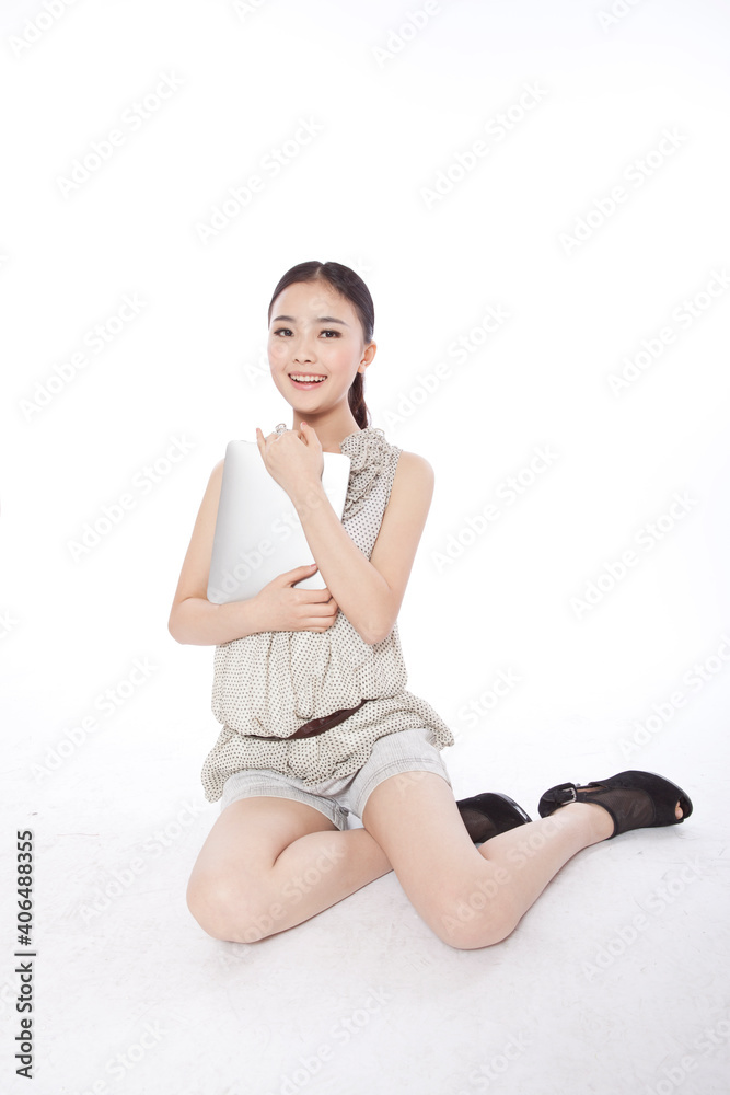 Portrait of a Young woman using tablet computer Portrait of a Young woman using tablet computer