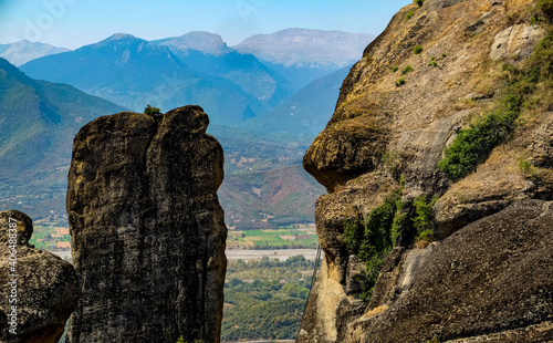 The Meteora  is a rock formation in central Greece hosting one of the largest and most precipitously built complexes of Eastern Orthodox monasteries, second in importance only to Mount Athos. photo