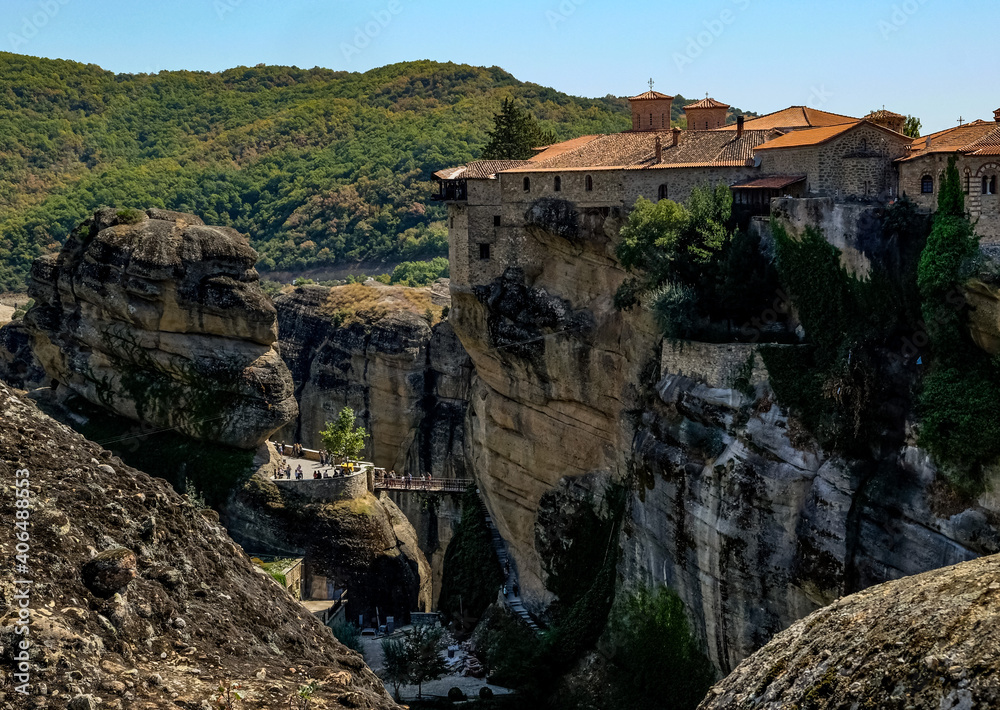 The Meteora  is a rock formation in central Greece hosting one of the largest and most precipitously built complexes of Eastern Orthodox monasteries, second in importance only to Mount Athos.