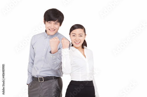 Portrait of business man and business woman cheering