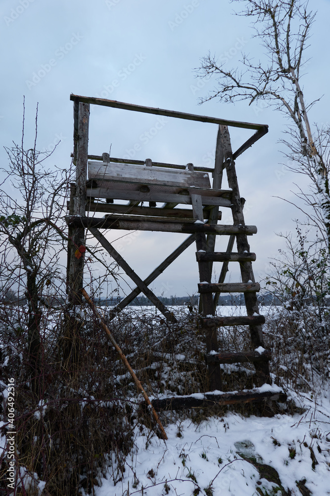 Hunting towers - elevated places for hunters on the edges of fields, forests in Central Bohemia at the beginning of 2021 Hunting towers - elevated places for hunters on the edges of fields, forests in Central Bohemia at the beginning of 2021