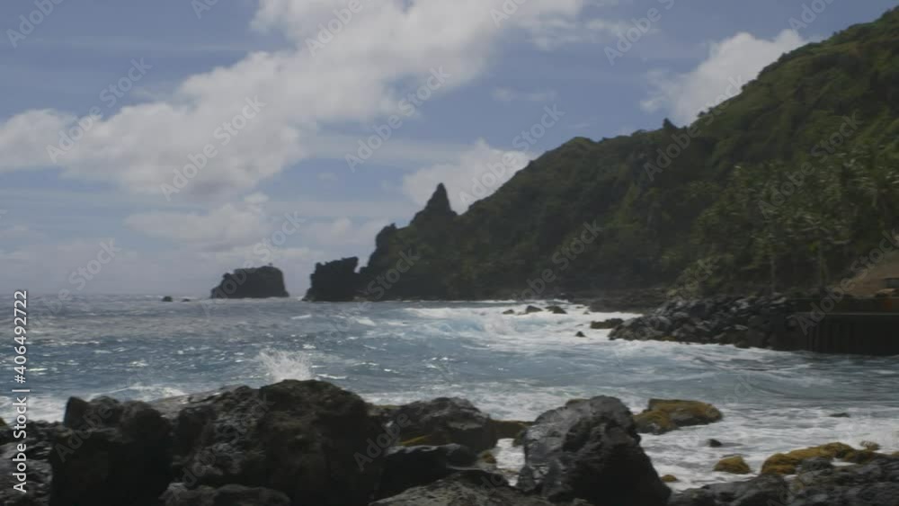Panorama on Pitcairn Island landing and dock. From ocean to the mountains and rocks of Pitcairn Panorama on Pitcairn Island landing and dock. From ocean to the mountains and rocks of Pitcairn