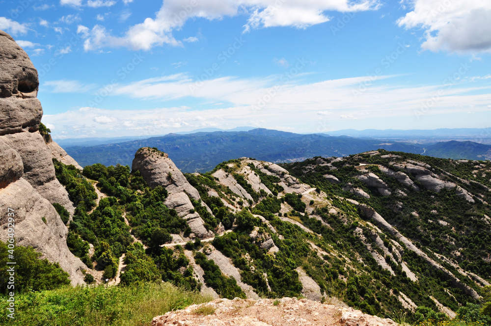 Panoramic view of the mountains with small vegetation on a summer sunny day. 