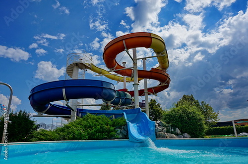 Colorful water slide in Senec, Slovakia, on a sunny summer day