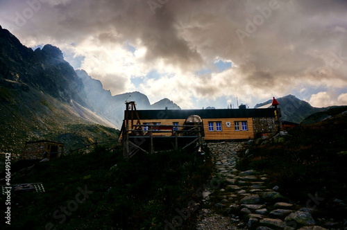 Mountain chalet Zbojnicka chata in evening light on a cloudy day in the High Tatras mountains in Slovakia