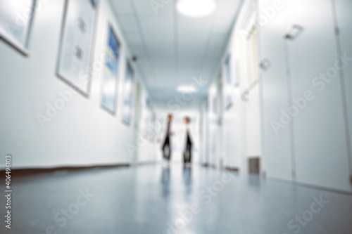 Hospital corridor long white person doctor patient walk