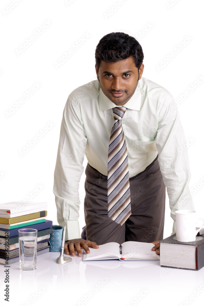 Indian business posing, isolated on a white background. Indian business posing, isolated on a white background.