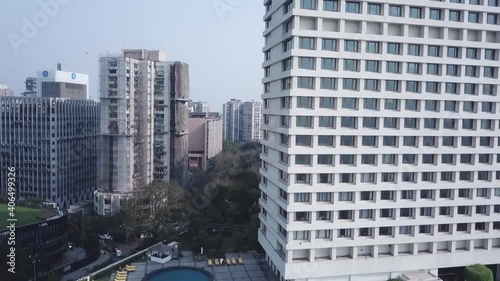 Trident Hotel Against Blue Sky With Skyline At Nariman Point, Mumbai City, India. - Aerial Shot photo