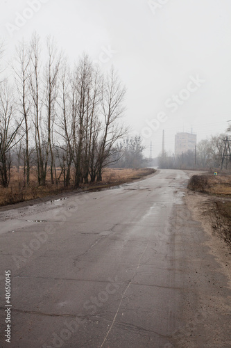 Old abandoned factory on a gloomy rainy day