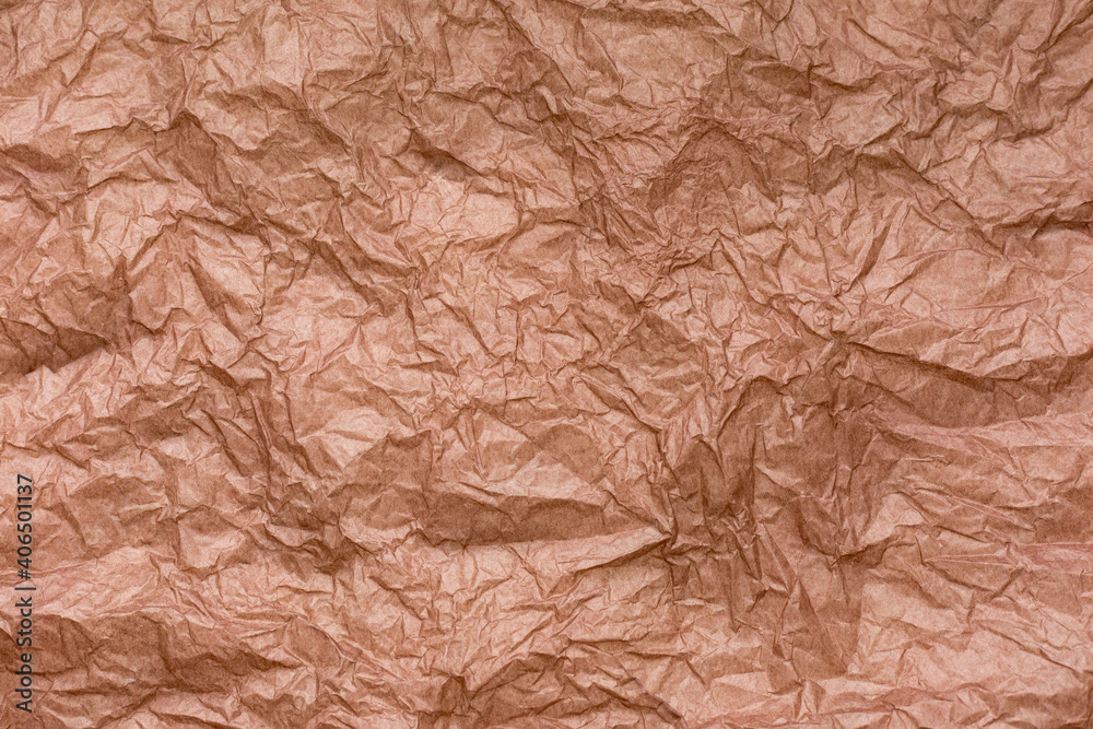 Crumpled brown paper as background, texture, pattern. Crumpled brown paper as background, texture, pattern.