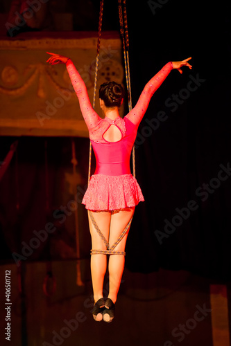 Children gymnasts perform under the circus dome