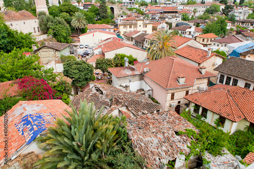 Sea view through the red roofs of the city