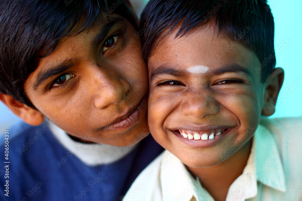 Two happy Indian teen boys looking to the camera. Two happy Indian teen boys looking to the camera.