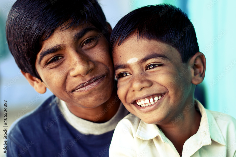 Two happy Indian teen boys looking to the camera. Two happy Indian teen boys looking to the camera.