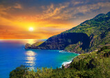 Beautiful coastline of Madeira island at sunset, seascape background - Portugal