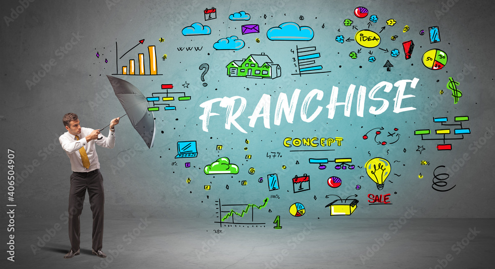 Determined businessman hiding behind umbrella with FRANCHISE inscription, new business concept Determined businessman hiding behind umbrella with FRANCHISE inscription, new business concept