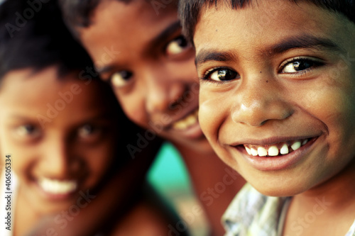 Group of happy teen boys looking at the camera.