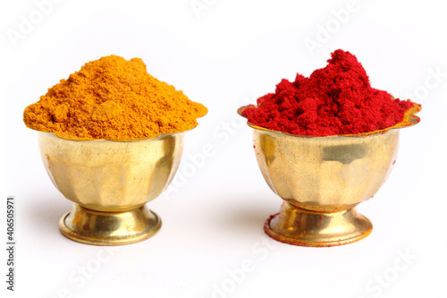 Canvas Print Turmeric and kumkum powder on white background.
