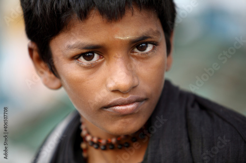 Indian teen boy portrait at outdoor.