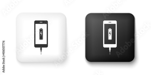 Black and white Smartphone battery charge icon isolated on white background. Phone with a low battery charge and with USB connection. Square button. Vector.