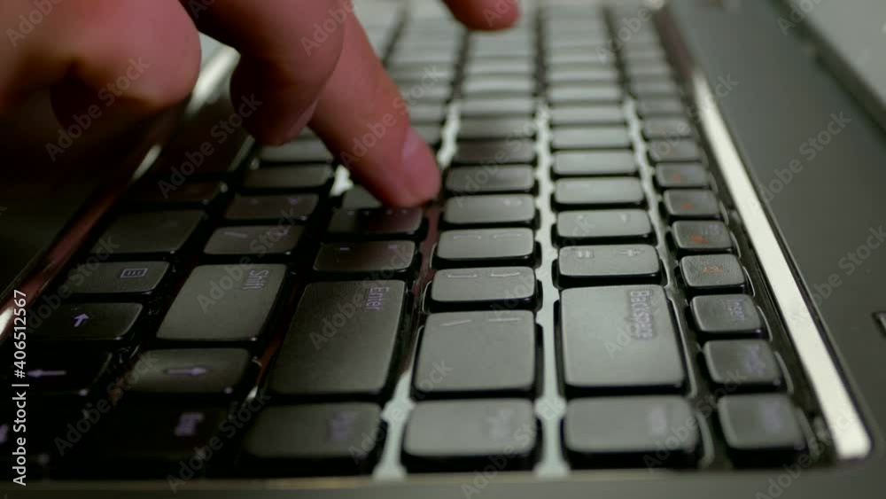 Press the buttons on the laptop keyboard. Work on computer. Type text with your fingers. Press the buttons on the laptop keyboard. Work on computer. Type text with your fingers.