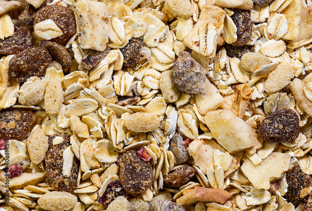 Homemade sugar free granola with dry fruits macro view. Healthy tasty diet food background.