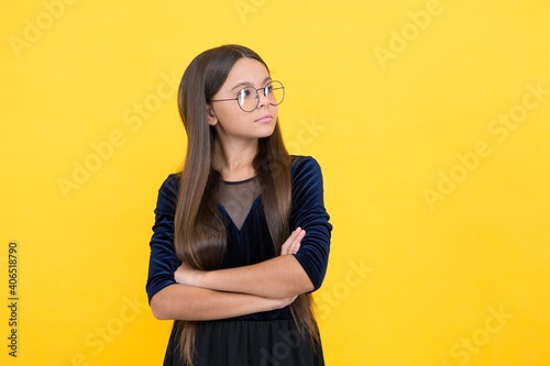 looking away. smart looking child. kid accessory fashion. oculist concept. teenager has poor eyesight. need to improve eyesight. childhood health. teen girl wear glasses. express human emotions © be free