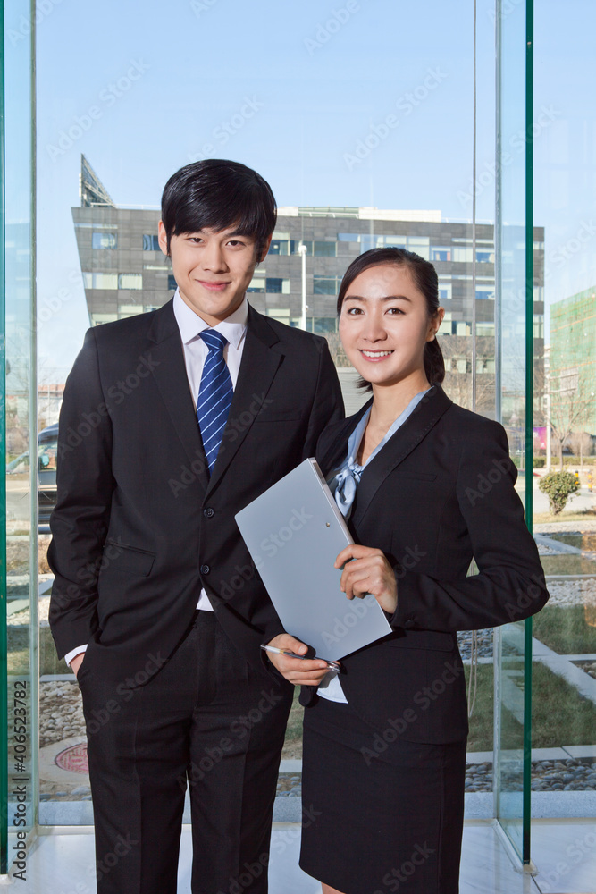 Business man and business woman working happily Business man and business woman working happily