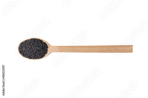 Black Sesame seeds in wooden spoon isolated on white background. Spices and food ingredients.