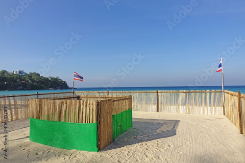 Protection and surveilance enclosure for sea turtle eggs on the beach. Leatherback sea turtle eggs nest protection on Kata beach, Phuket Thailand photo