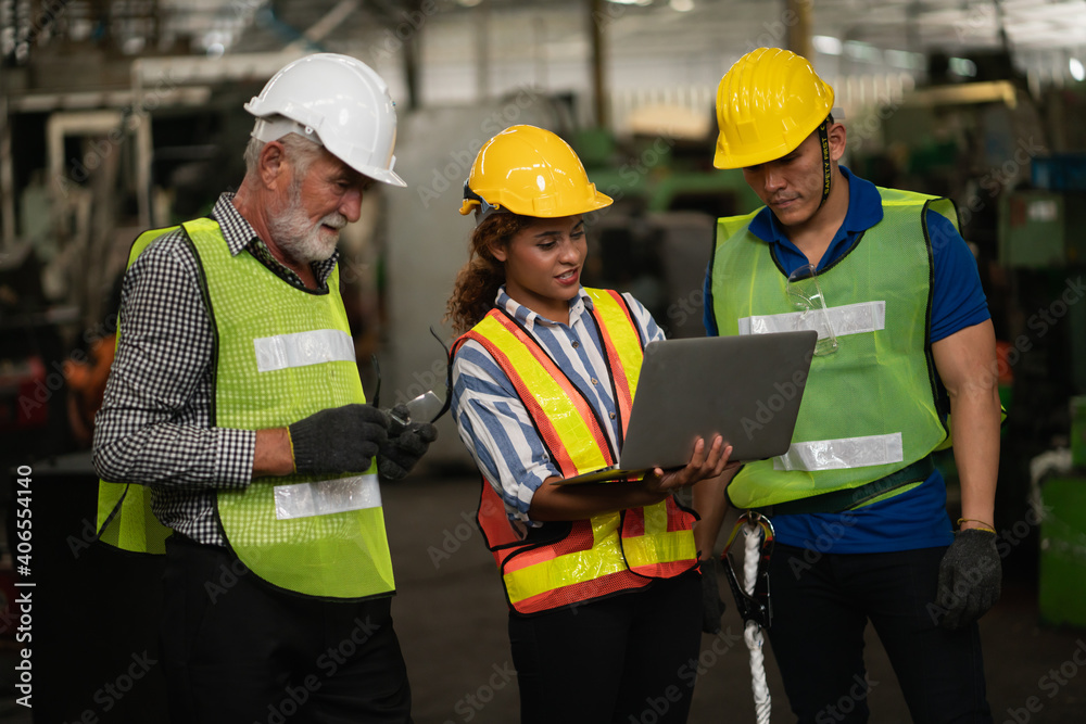 Technical team machine security system learning.factory manufacturing .Industry worker man standing in factory .Employee warehouse factory operators. women black worker in factory and engineering team Technical team machine security system learning.factory manufacturing .Industry worker man standing in factory .Employee warehouse factory operators. women black worker in factory and engineering team