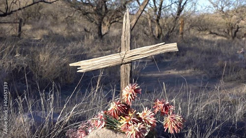 A humble cross marking an old grave in an Arizona ghost town