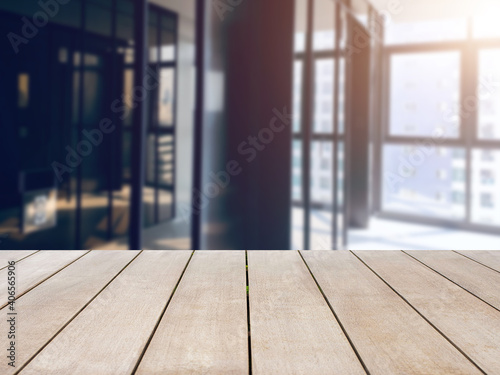 Empty old wooden shelf in department store background with sunlight and copy space. Ready for product display concept. You can place your products on wooden planks to increase your business sales.