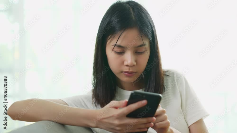 woman using smartphone, During leisure time. The concept of using the phone is essential in everyday life. woman using smartphone, During leisure time. The concept of using the phone is essential in everyday life.