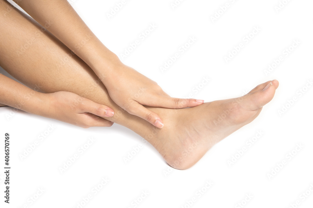Young woman, she is using her hand Touch your feet. Isolated white background Young woman, she is using her hand Touch your feet. Isolated white background
