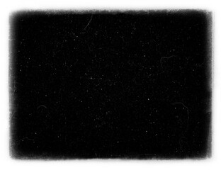 Abstract dirty or aging film frame. Dust particle and grain texture or dirt use for overlay film frame effect with space for vintage grunge design.