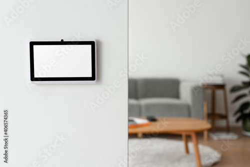 Smart home screen panel monitor in a living room