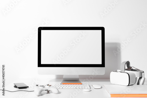Blank computer screen on a table