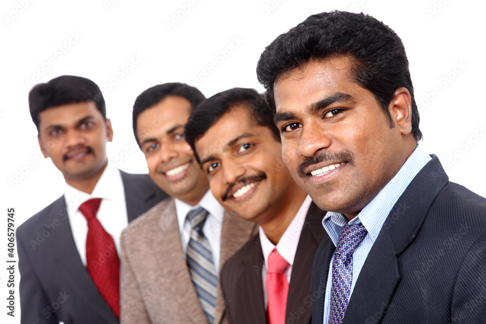 A smart Indian business team taken with selective focus isolated on white. A smart Indian business team taken with selective focus isolated on white.