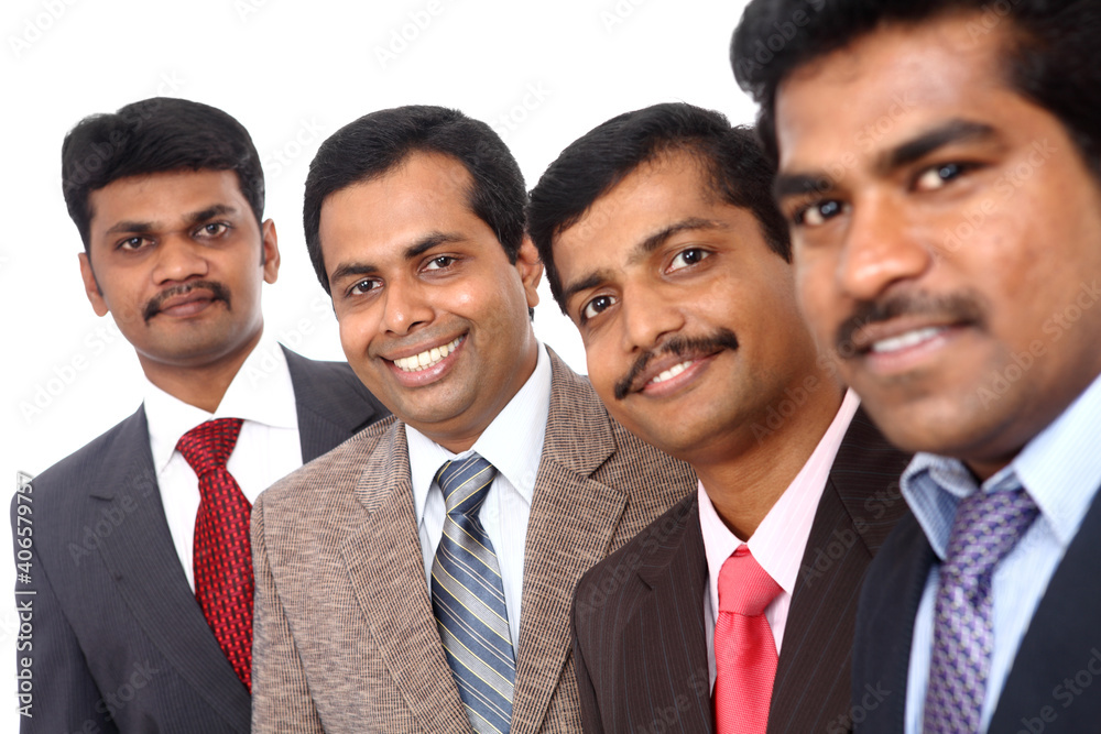 A smart Indian business team taken with selective focus isolated on white. A smart Indian business team taken with selective focus isolated on white.